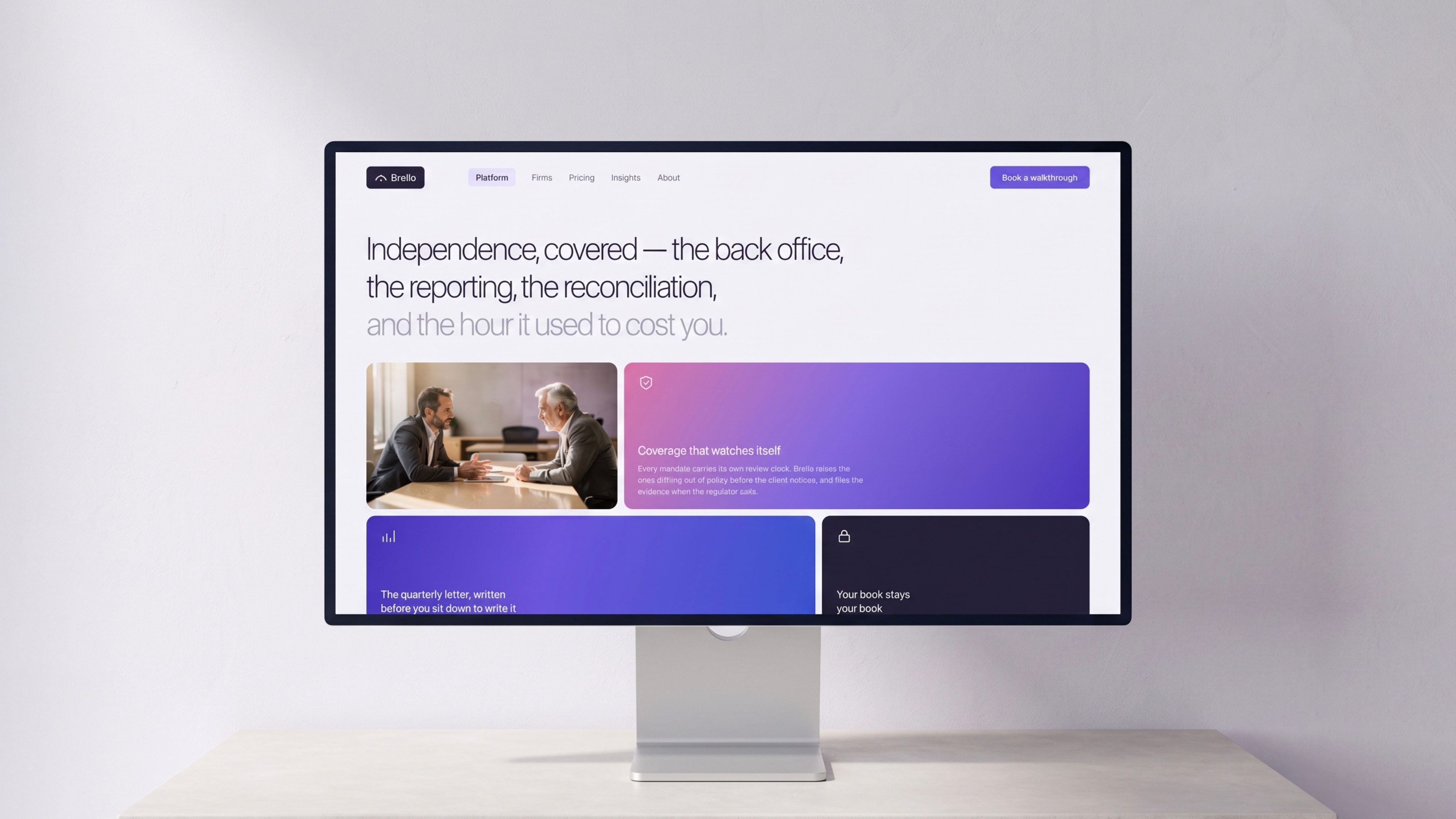 The Brello website open on a desktop display in a bright room, showing the headline about independence and the back office.